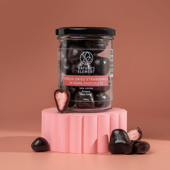 A premium gourmet treat of freeze-dried strawberries coated in rich black chocolate (50%+ cacao), offering a perfect balance of deep cocoa flavour and natural fruit sweetness.