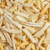 Freeze-Dried Mango | Natures Element (Close View) Freeze-dried mango pieces on pedestal – Natures Element