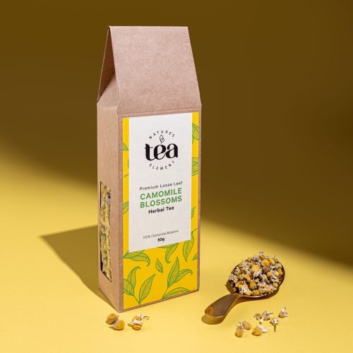 Nature’s Element – Camomile Blossoms Herbal Tea Nature’s Element Camomile Blossoms loose-leaf herbal tea with scoop on yellow background