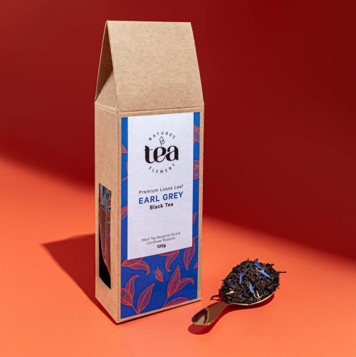 Nature’s Element – Earl Grey Black Tea Nature’s Element Earl Grey black tea with spoon on red background
