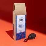 Nature’s Element English Breakfast black tea with spoon on red background