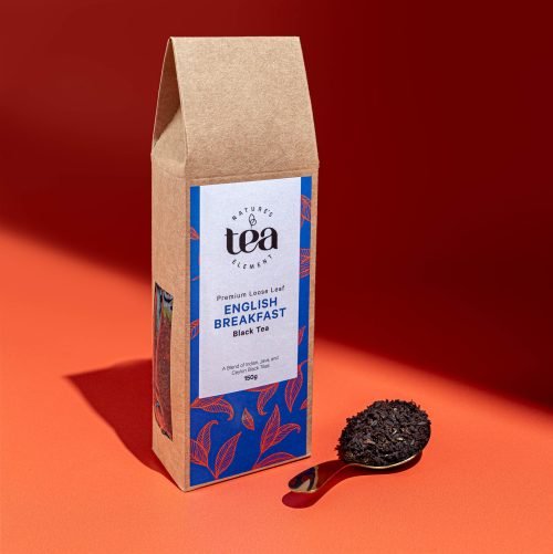 Nature’s Element – English Breakfast Black Tea Nature’s Element English Breakfast black tea with spoon on red background