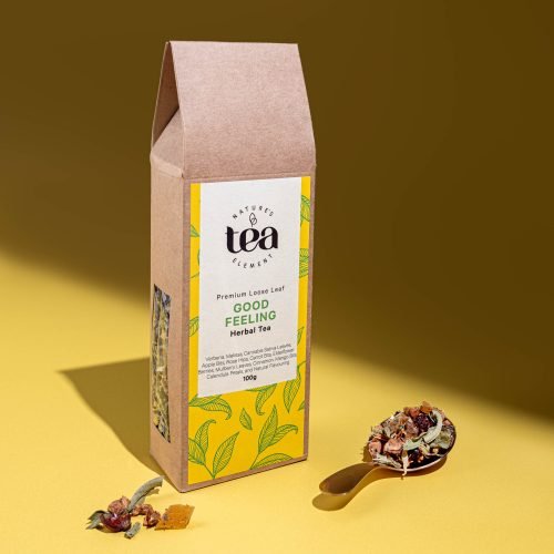 Nature’s Element – Good Feeling Herbal Tea Nature’s Element Good Feeling loose-leaf herbal tea with scoop on yellow background