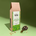 Nature’s Element Green Tea with Jasmine loose-leaf blend on green background
