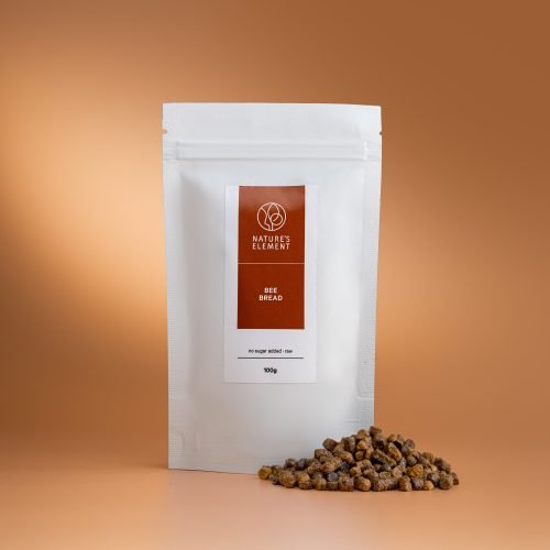 Nature’s Element – Bee Bread 100g Nature’s Element bee bread in white pouch on warm brown background – raw fermented superfood