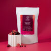 Freeze-dried berry mix 150g package by Nature's Element with strawberry slices, blueberries and cherries displayed on white pedestal