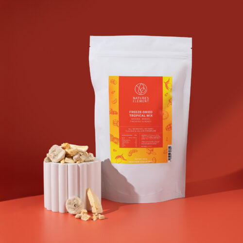 Freeze-dried tropical mix 150g package by Nature's Element with banana, mango, pineapple and peach displayed alongside